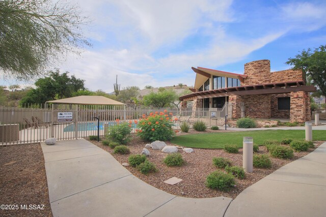 4416 N Saddle View Dr, Tucson, AZ 85750 - view of side of property with a community pool