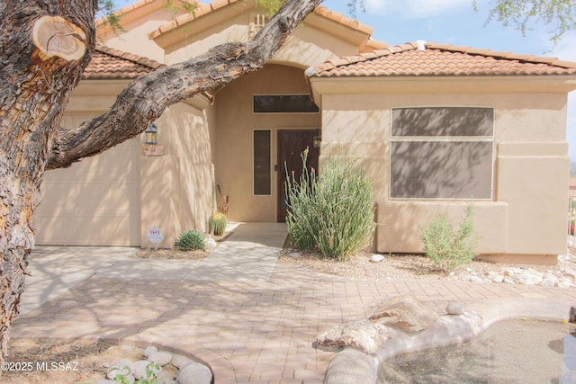 4416 N Saddle View Dr, Tucson, AZ 85750 - view of front of house with stucco siding and a tile roof