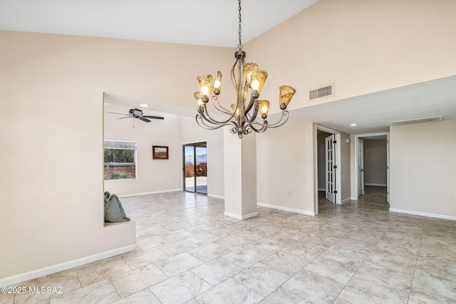 2742 S Via Del Bac, Green Valley, AZ 85622 - spare room with high vaulted ceiling, a chandelier, a ceiling fan, and baseboards