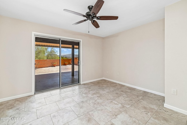 2742 S Via Del Bac, Green Valley, AZ 85622 - empty room with a ceiling fan and baseboards
