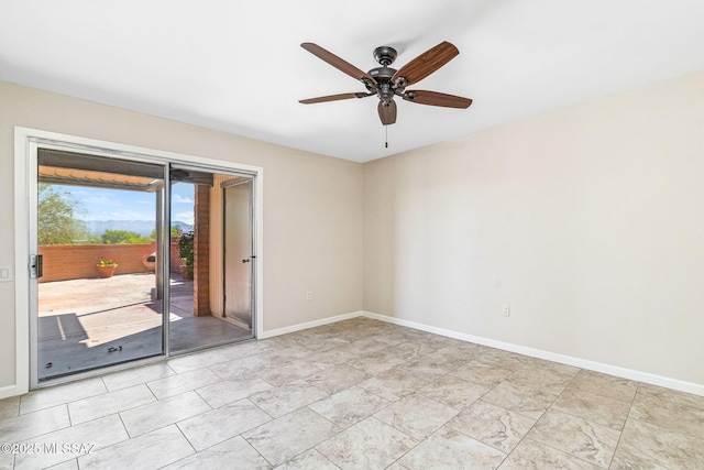 2742 S Via Del Bac, Green Valley, AZ 85622 - empty room featuring ceiling fan and baseboards