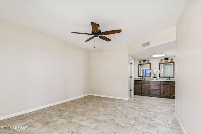 2742 S Via Del Bac, Green Valley, AZ 85622 - empty room with ceiling fan and baseboards