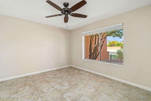 2742 S Via Del Bac, Green Valley, AZ 85622 - unfurnished room featuring a ceiling fan and baseboards