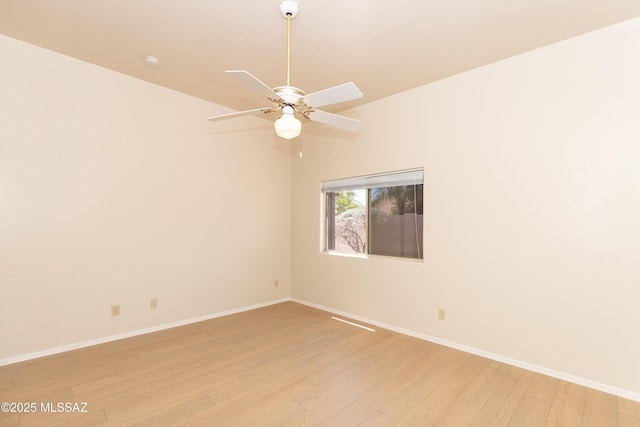 11629 N Copper Creek Dr, Oro Valley, AZ 85737 - spare room with light wood-style flooring, baseboards, and ceiling fan