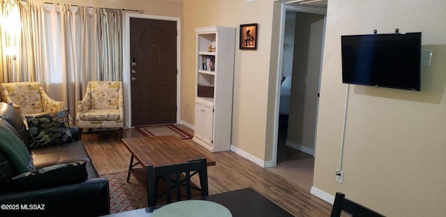 455 W Kelso St Apt 232, Tucson, AZ 85705 - living room with wood finished floors and baseboards