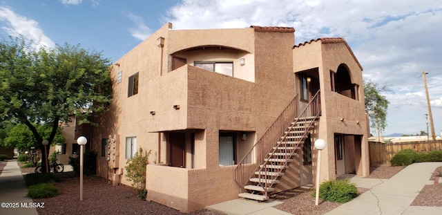 1745 E Glenn St # 5, Tucson, AZ 85719 - view of property with stairway