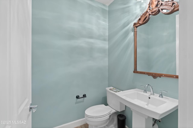 31566 S Misty Basin Rd, Oracle, AZ 85623 - half bath with a sink, toilet, and baseboards