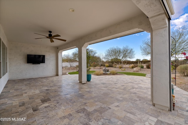 31566 S Misty Basin Rd, Oracle, AZ 85623 - fenced backyard with a ceiling fan and a patio area