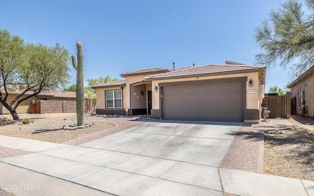 13570 E Hampden Green Way, Vail, AZ 85641 - ranch-style home with stucco siding, driveway, a garage, and a tiled roof
