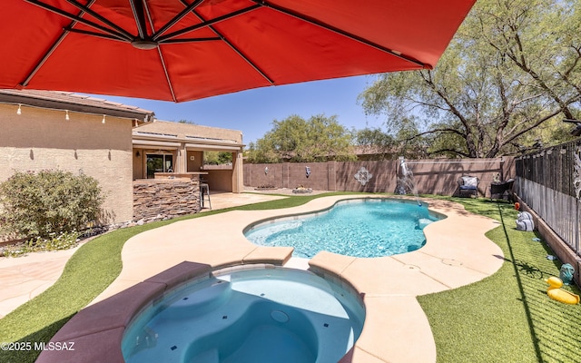 13570 E Hampden Green Way, Vail, AZ 85641 - view of swimming pool with a patio area, a fenced backyard, a pool with connected hot tub, and an outdoor bar