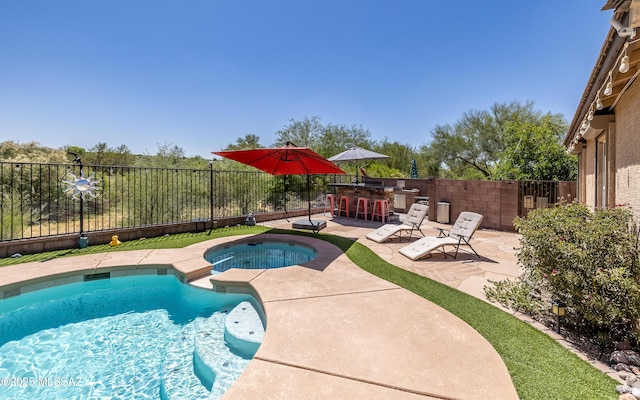 13570 E Hampden Green Way, Vail, AZ 85641 - view of pool featuring a fenced backyard, a patio, and a pool with connected hot tub
