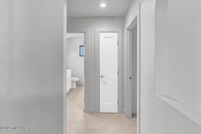 8046 S New Abbey Dr, Tucson, AZ 85747 - hallway featuring light tile patterned flooring and recessed lighting