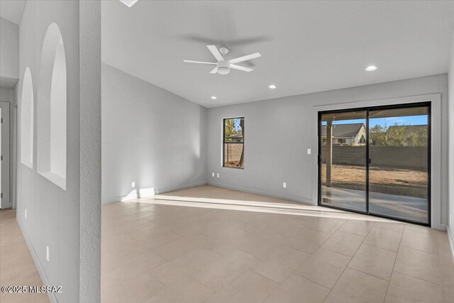 8046 S New Abbey Dr, Tucson, AZ 85747 - empty room featuring a ceiling fan, healthy amount of natural light, recessed lighting, and baseboards