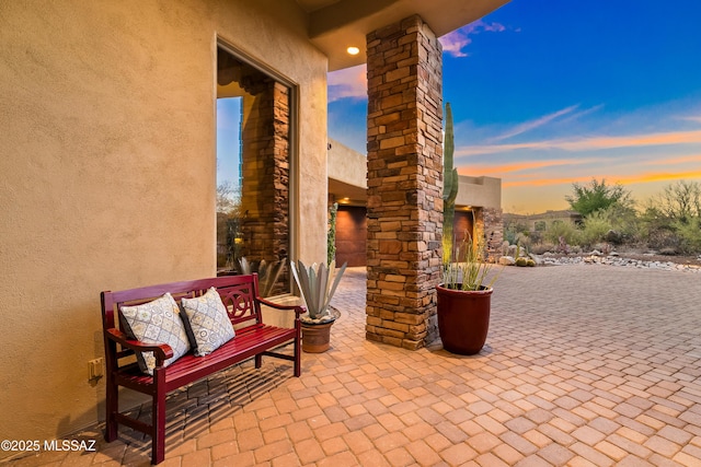 545 E Thunderstorm Pl, Oro Valley, AZ 85755 - patio terrace at dusk with a patio