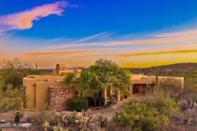 545 E Thunderstorm Pl, Oro Valley, AZ 85755 - view of front of house with stucco siding