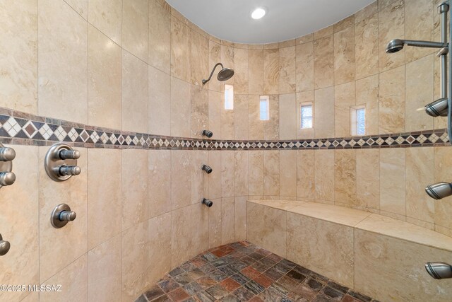 545 E Thunderstorm Pl, Oro Valley, AZ 85755 - bathroom with tiled shower and stone finish floors
