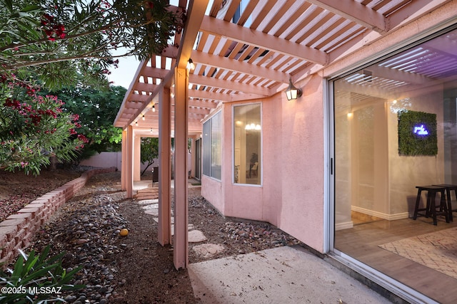 9870 N Meadow Flower Pl, Tucson, AZ 85742 - view of patio featuring a pergola and fence