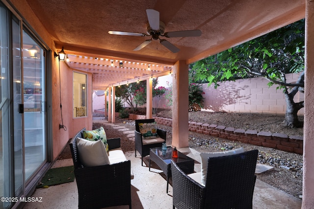9870 N Meadow Flower Pl, Tucson, AZ 85742 - view of patio with a pergola, a fenced backyard, ceiling fan, and an outdoor living space