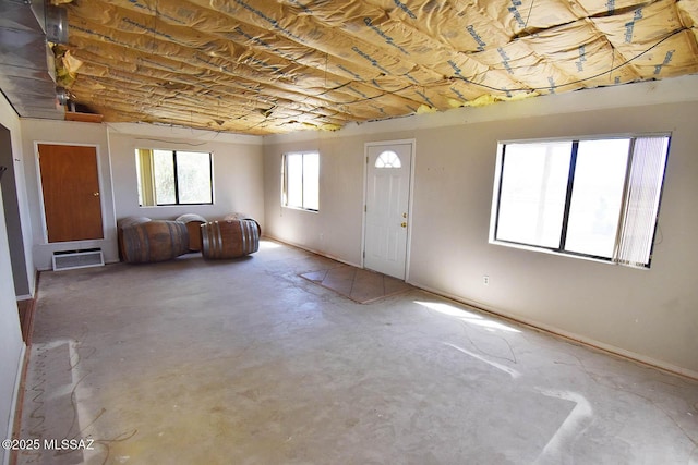 1203 N Cochise Stronghold Rd, Cochise, AZ 85606 - entrance foyer featuring unfinished concrete flooring and baseboards