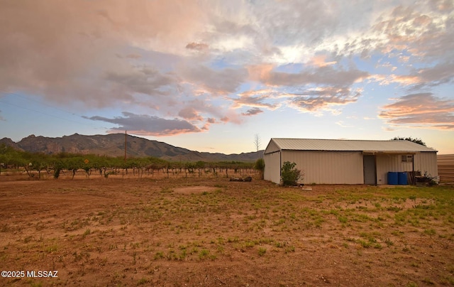 1203 N Cochise Stronghold Rd, Cochise, AZ 85606 - view of yard with a pole building, a mountain view, an outbuilding, and a view of rural / pastoral area