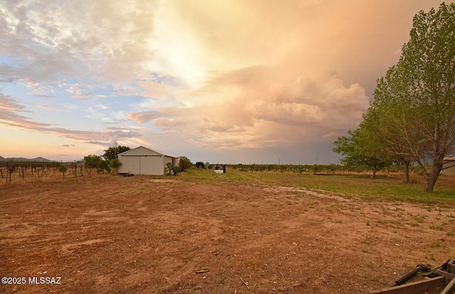 1203 N Cochise Stronghold Rd, Cochise, AZ 85606 - view of yard with a view of countryside, a pole building, and an outbuilding