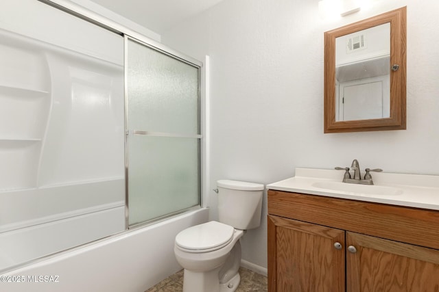 7244 S Camino Del Arco Iris, Tucson, AZ 85746 - bathroom with toilet, vanity, combined bath / shower with glass door, baseboards, and tile patterned floors