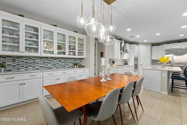 7106 W Foothills Acacia Pl, Marana, AZ 85658 - dining area with recessed lighting and light tile patterned flooring