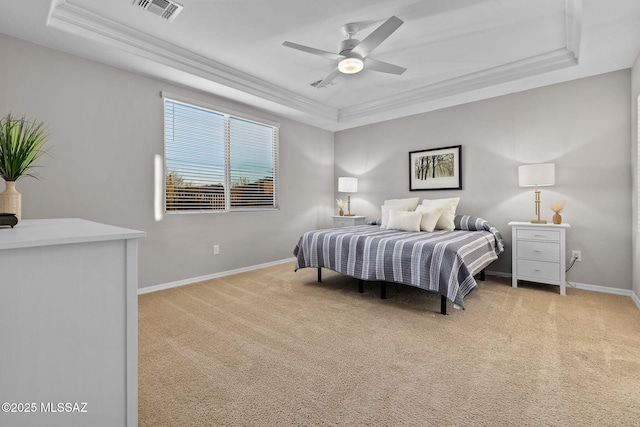 7106 W Foothills Acacia Pl, Marana, AZ 85658 - bedroom featuring a tray ceiling, crown molding, carpet, baseboards, and a ceiling fan