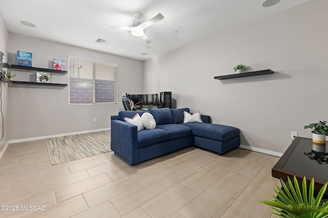 7106 W Foothills Acacia Pl, Marana, AZ 85658 - living room with ceiling fan, baseboards, and wood tiled floors