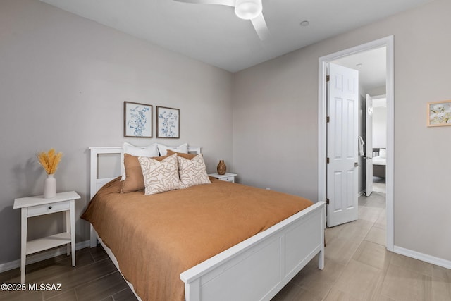 7106 W Foothills Acacia Pl, Marana, AZ 85658 - bedroom with baseboards, ceiling fan, and wood finished floors