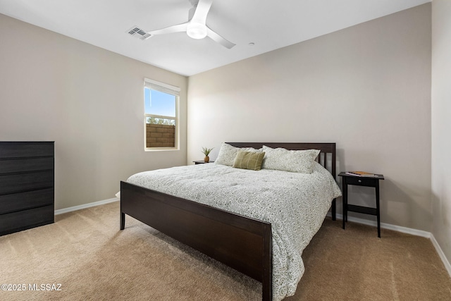7106 W Foothills Acacia Pl, Marana, AZ 85658 - bedroom featuring light colored carpet, baseboards, and ceiling fan