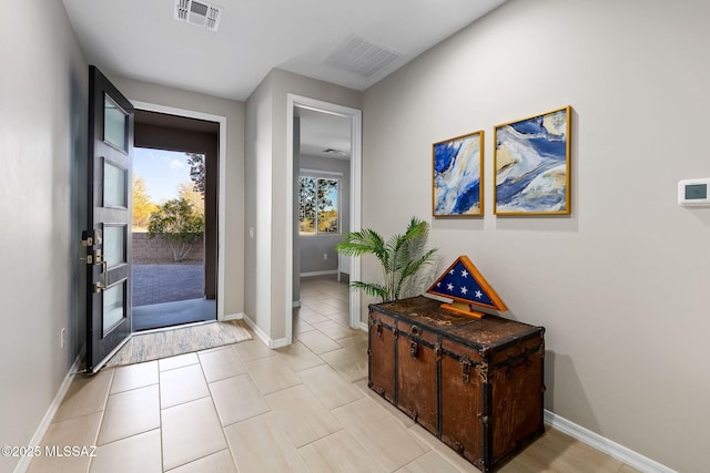 7106 W Foothills Acacia Pl, Marana, AZ 85658 - foyer featuring baseboards and light tile patterned floors