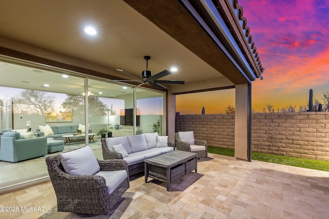 7106 W Foothills Acacia Pl, Marana, AZ 85658 - view of patio / terrace with an outdoor living space and a ceiling fan