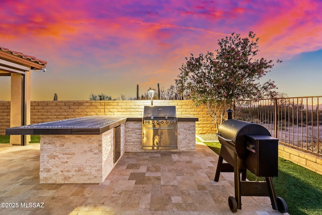 7106 W Foothills Acacia Pl, Marana, AZ 85658 - fenced backyard featuring a patio area