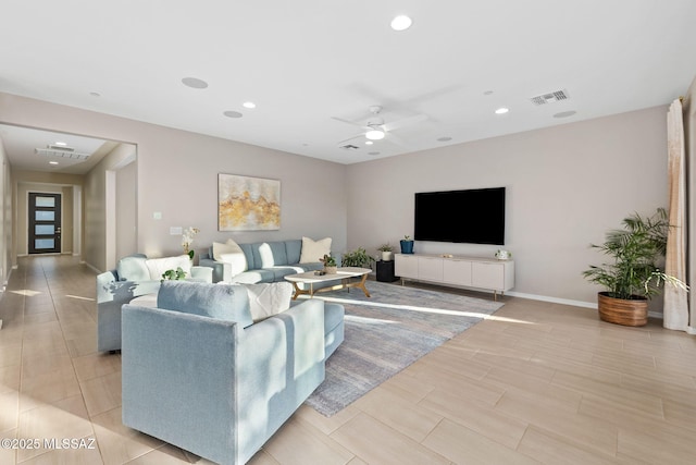 7106 W Foothills Acacia Pl, Marana, AZ 85658 - living area featuring recessed lighting, a ceiling fan, baseboards, and wood finish floors