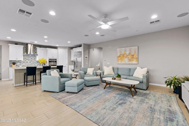 7106 W Foothills Acacia Pl, Marana, AZ 85658 - living room with recessed lighting, a ceiling fan, baseboards, and light wood-style floors