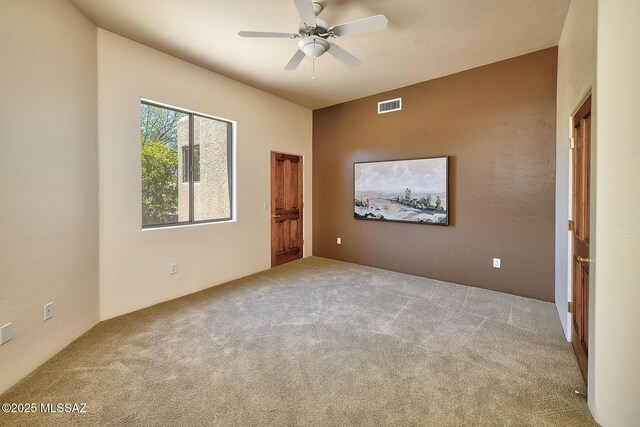 5269 N Pontatoc Rd, Tucson, AZ 85718 - spare room with carpet and ceiling fan