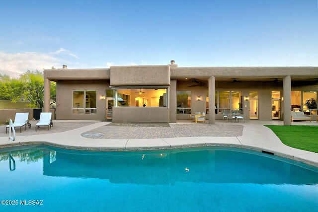 5269 N Pontatoc Rd, Tucson, AZ 85718 - swimming pool featuring ceiling fan, a patio area, and an outdoor hangout area