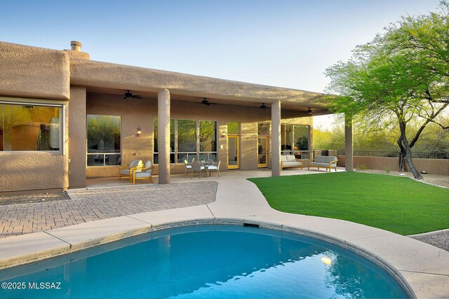 5269 N Pontatoc Rd, Tucson, AZ 85718 - outdoor pool featuring a ceiling fan, an outdoor hangout area, and a patio area