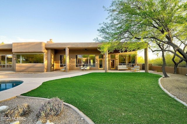 5269 N Pontatoc Rd, Tucson, AZ 85718 - back of house with a ceiling fan, a patio area, an outdoor pool, and outdoor lounge area
