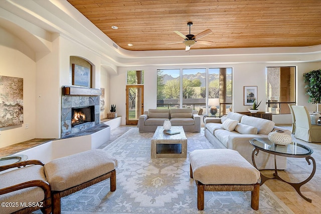 5269 N Pontatoc Rd, Tucson, AZ 85718 - living room with wood ceiling, a ceiling fan, a fireplace, and recessed lighting