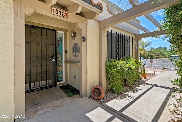 1018 Cll De La Temporada, Green Valley, AZ 85614 - doorway to property featuring stucco siding
