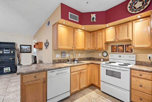 1018 Cll De La Temporada, Green Valley, AZ 85614 - kitchen featuring white appliances, a sink, light tile patterned floors, a peninsula, and lofted ceiling