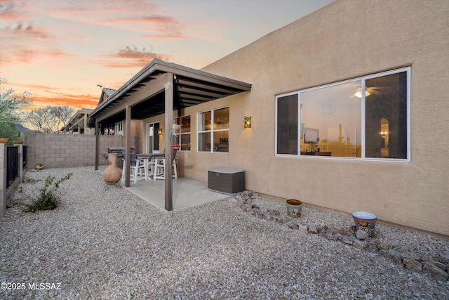 182 N Desert Park Pl, Tucson, AZ 85745 - rear view of house featuring a patio area, stucco siding, and a fenced backyard