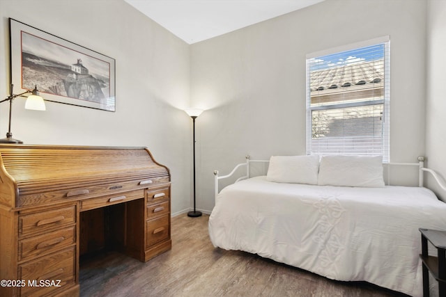 182 N Desert Park Pl, Tucson, AZ 85745 - bedroom with wood finished floors and baseboards
