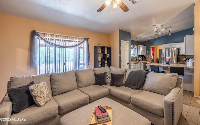 253 Grillo Ct, Rio Rico, AZ 85648 - living area with a ceiling fan