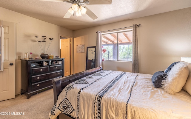 253 Grillo Ct, Rio Rico, AZ 85648 - bedroom featuring light colored carpet and ceiling fan