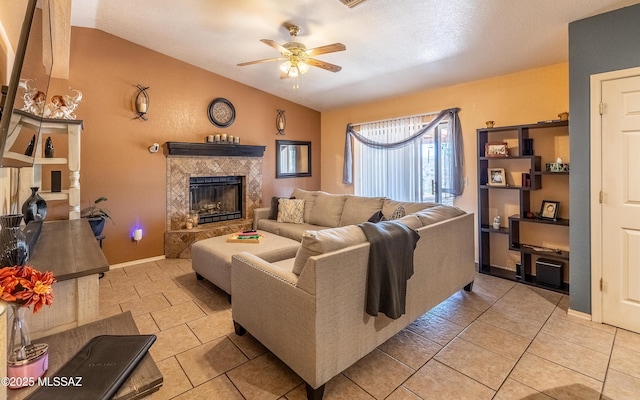 253 Grillo Ct, Rio Rico, AZ 85648 - living room with ceiling fan, a tile fireplace, and baseboards
