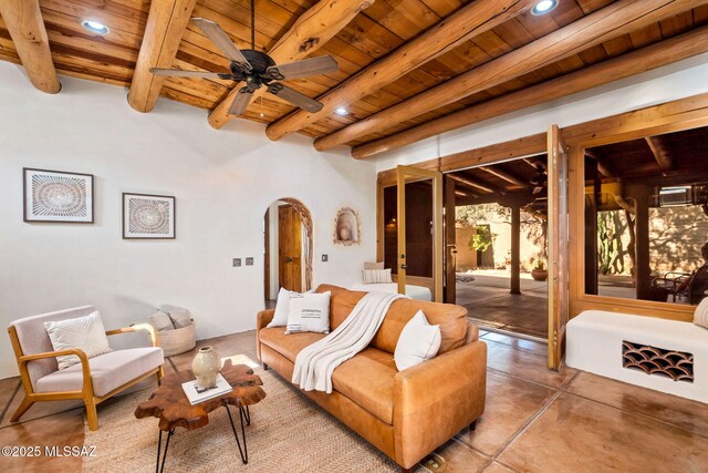 3008 E Placita Santa Lucia, Tucson, AZ 85716 - living area with a wooden ceiling with exposed beams, arched walkways, recessed lighting, finished concrete flooring, and a ceiling fan