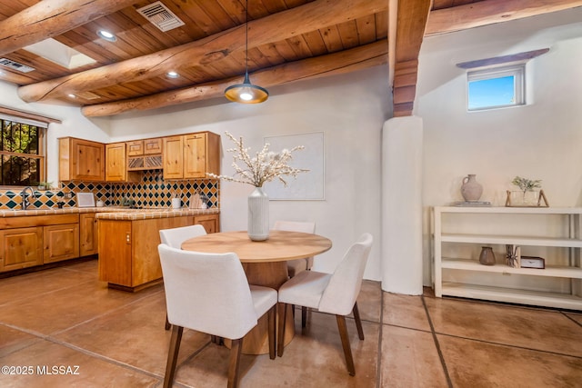 3008 E Placita Santa Lucia, Tucson, AZ 85716 - dining space with a wood ceiling with exposed beams, recessed lighting, and concrete floors